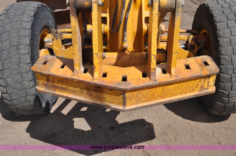 image for item G6454 1998 John Deere 770CH articulated motor grader