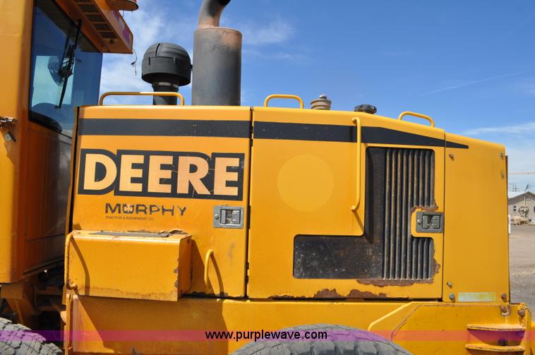 image for item G6454 1998 John Deere 770CH articulated motor grader