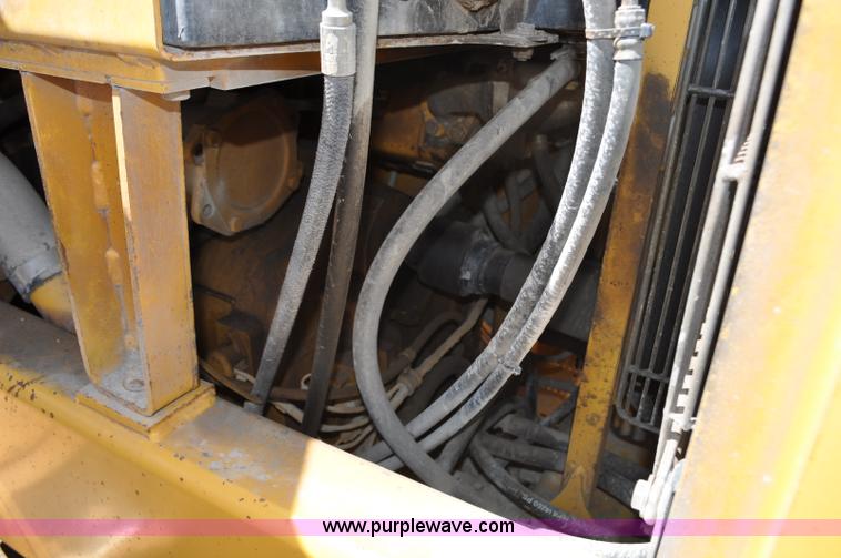 image for item G6454 1998 John Deere 770CH articulated motor grader