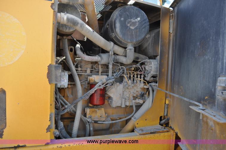 image for item G6454 1998 John Deere 770CH articulated motor grader