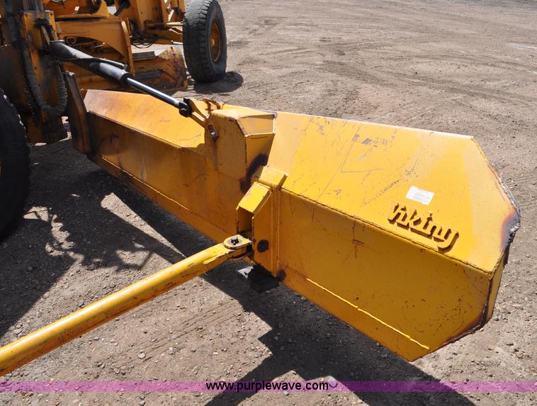 image for item G6454 1998 John Deere 770CH articulated motor grader