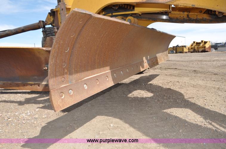 image for item G6454 1998 John Deere 770CH articulated motor grader