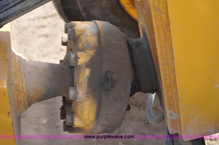 image for item G6454 1998 John Deere 770CH articulated motor grader