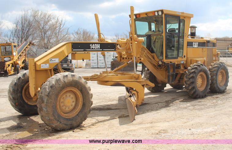 image for item H1421 1998 Caterpillar 140H articulated motor grader