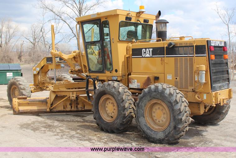 image for item H1421 1998 Caterpillar 140H articulated motor grader