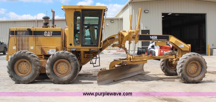 image for item H1421 1998 Caterpillar 140H articulated motor grader