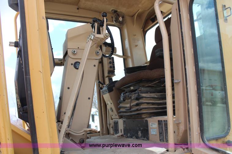 image for item H1421 1998 Caterpillar 140H articulated motor grader