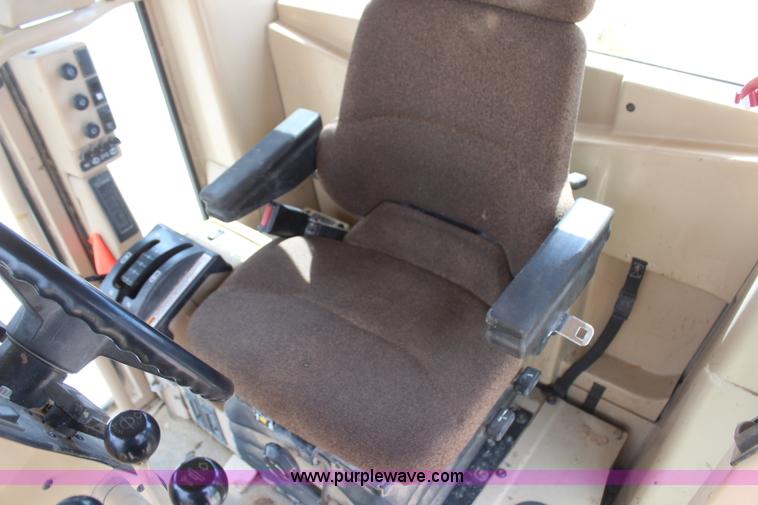 image for item H1421 1998 Caterpillar 140H articulated motor grader