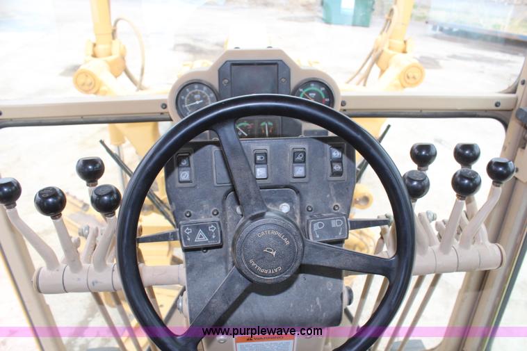 image for item H1421 1998 Caterpillar 140H articulated motor grader