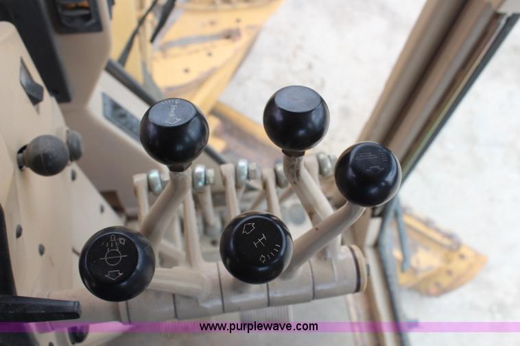 image for item H1421 1998 Caterpillar 140H articulated motor grader