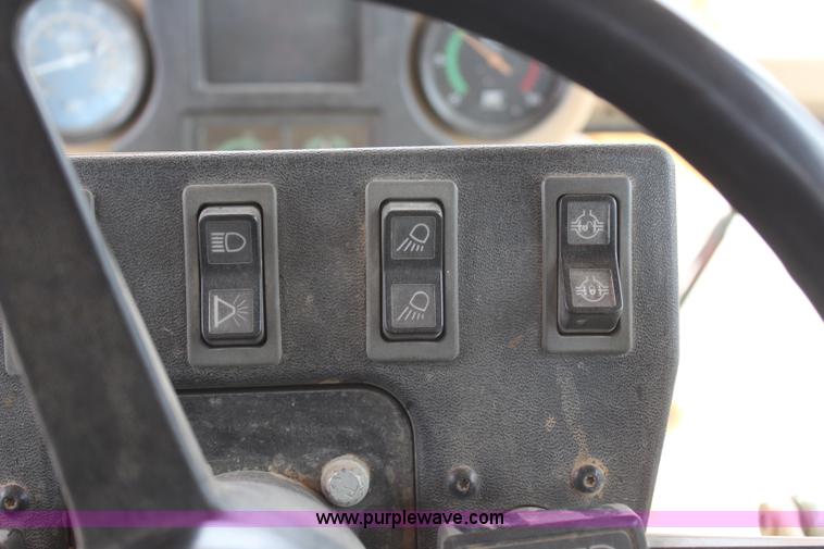 image for item H1421 1998 Caterpillar 140H articulated motor grader