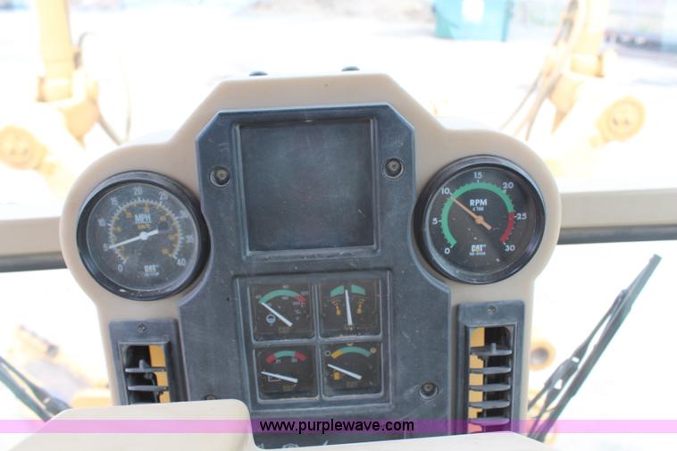 image for item H1421 1998 Caterpillar 140H articulated motor grader