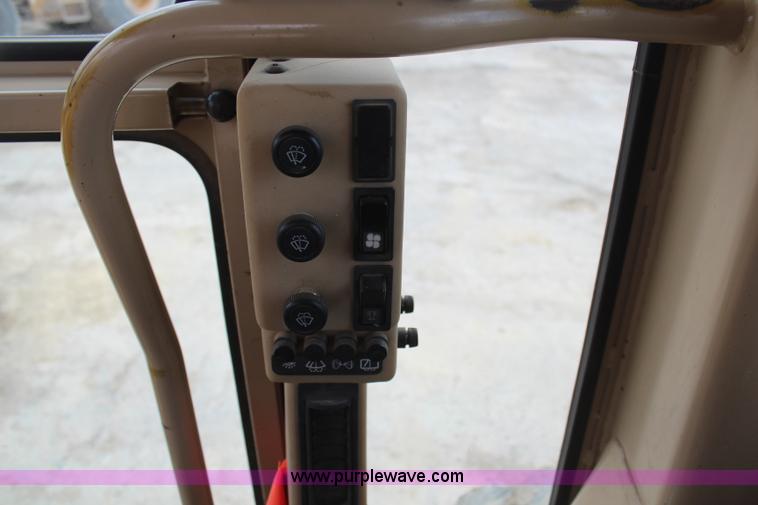 image for item H1421 1998 Caterpillar 140H articulated motor grader