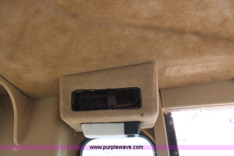 image for item H1421 1998 Caterpillar 140H articulated motor grader