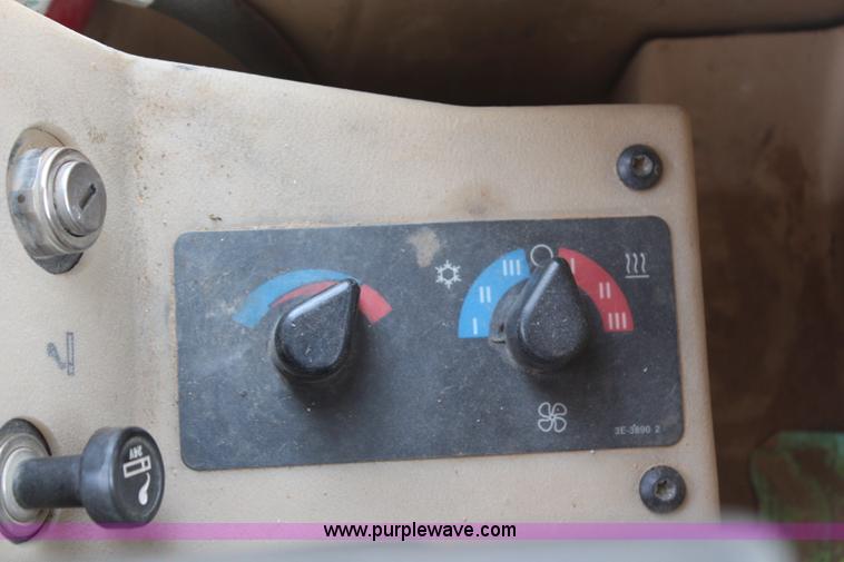 image for item H1421 1998 Caterpillar 140H articulated motor grader