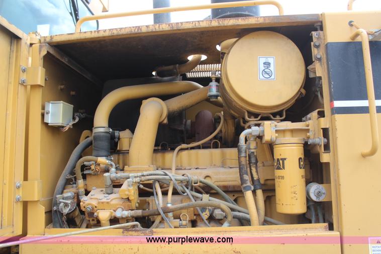 image for item H1421 1998 Caterpillar 140H articulated motor grader
