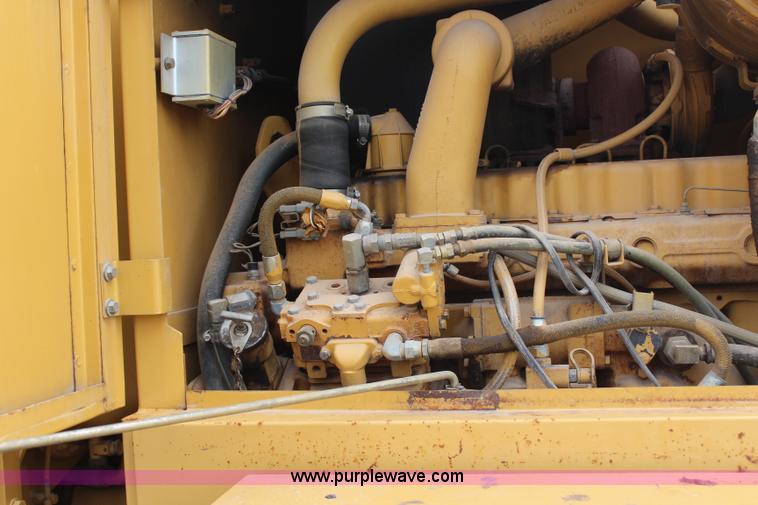 image for item H1421 1998 Caterpillar 140H articulated motor grader