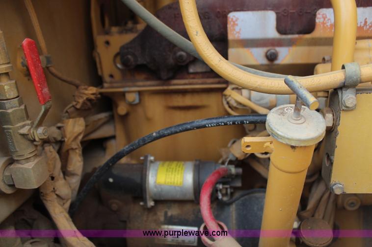 image for item H1421 1998 Caterpillar 140H articulated motor grader