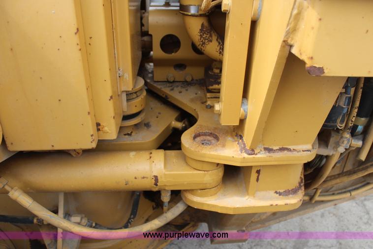 image for item H1421 1998 Caterpillar 140H articulated motor grader