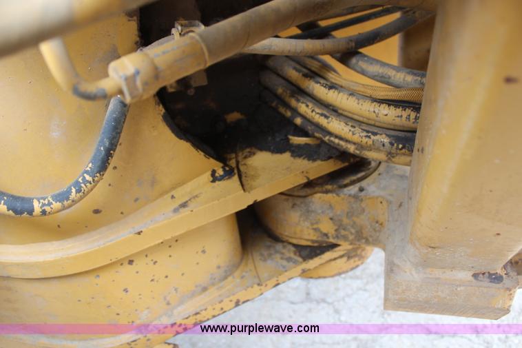image for item H1421 1998 Caterpillar 140H articulated motor grader