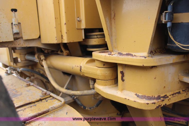 image for item H1421 1998 Caterpillar 140H articulated motor grader