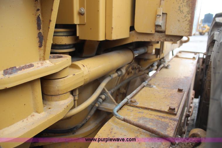 image for item H1421 1998 Caterpillar 140H articulated motor grader