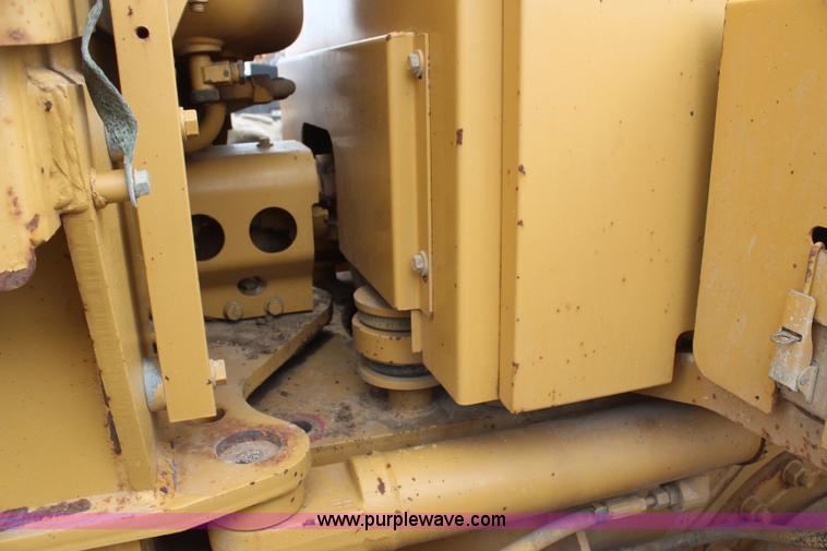 image for item H1421 1998 Caterpillar 140H articulated motor grader
