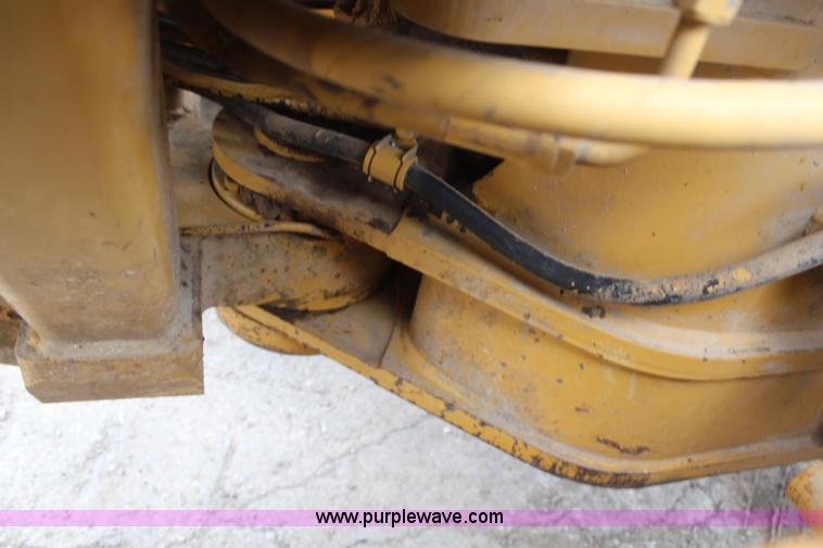 image for item H1421 1998 Caterpillar 140H articulated motor grader