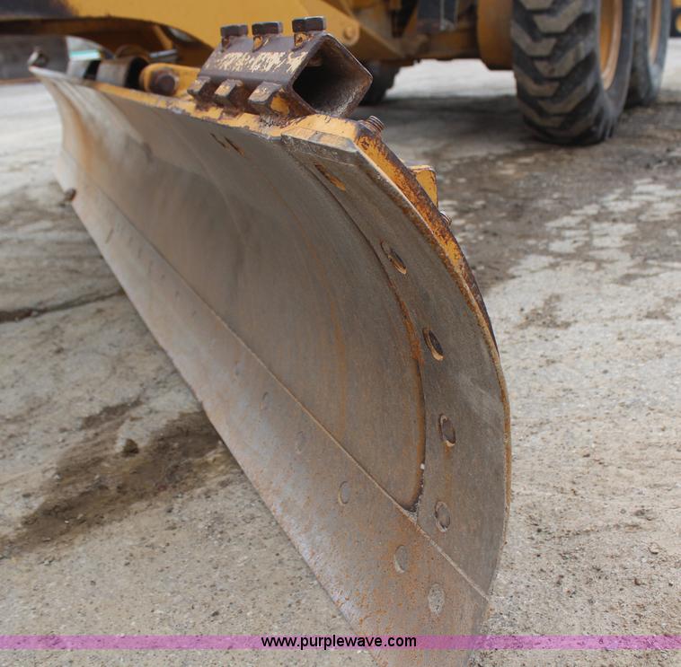 image for item H1421 1998 Caterpillar 140H articulated motor grader