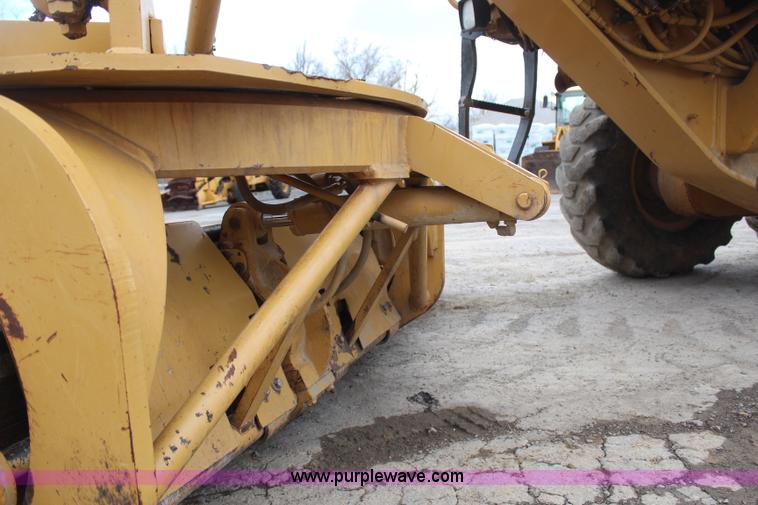 image for item H1421 1998 Caterpillar 140H articulated motor grader
