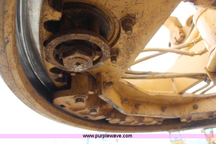 image for item H1421 1998 Caterpillar 140H articulated motor grader