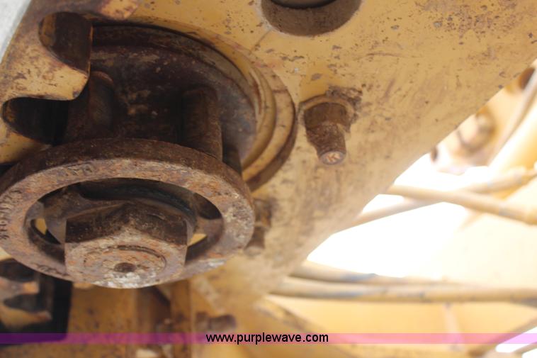 image for item H1421 1998 Caterpillar 140H articulated motor grader