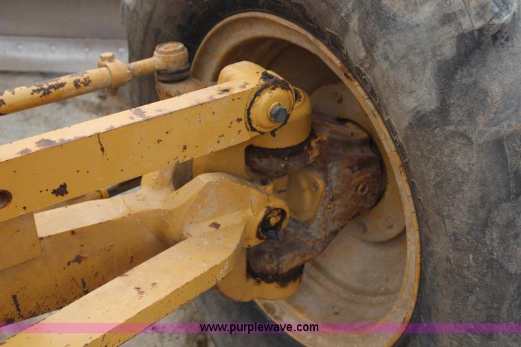 image for item H1421 1998 Caterpillar 140H articulated motor grader