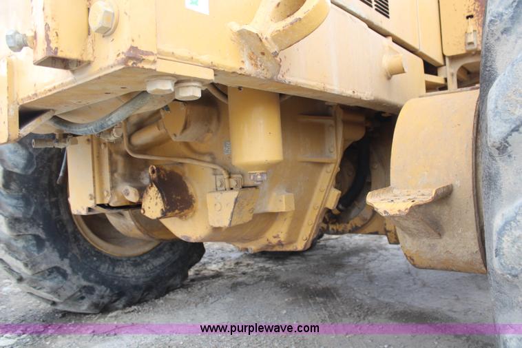 image for item H1421 1998 Caterpillar 140H articulated motor grader