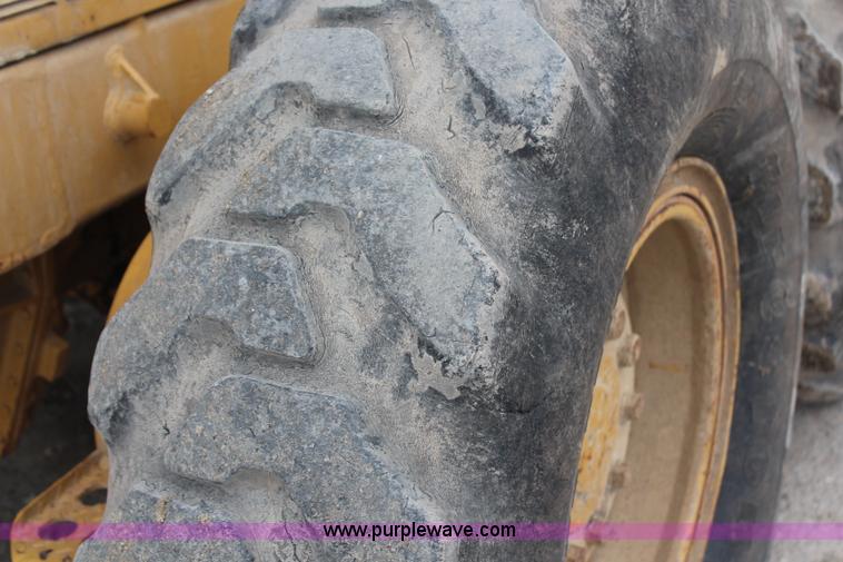 image for item H1421 1998 Caterpillar 140H articulated motor grader