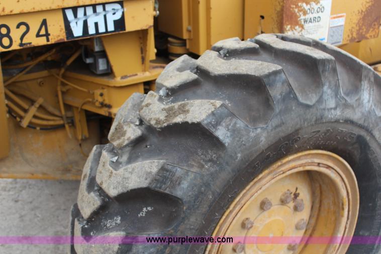 image for item H1421 1998 Caterpillar 140H articulated motor grader