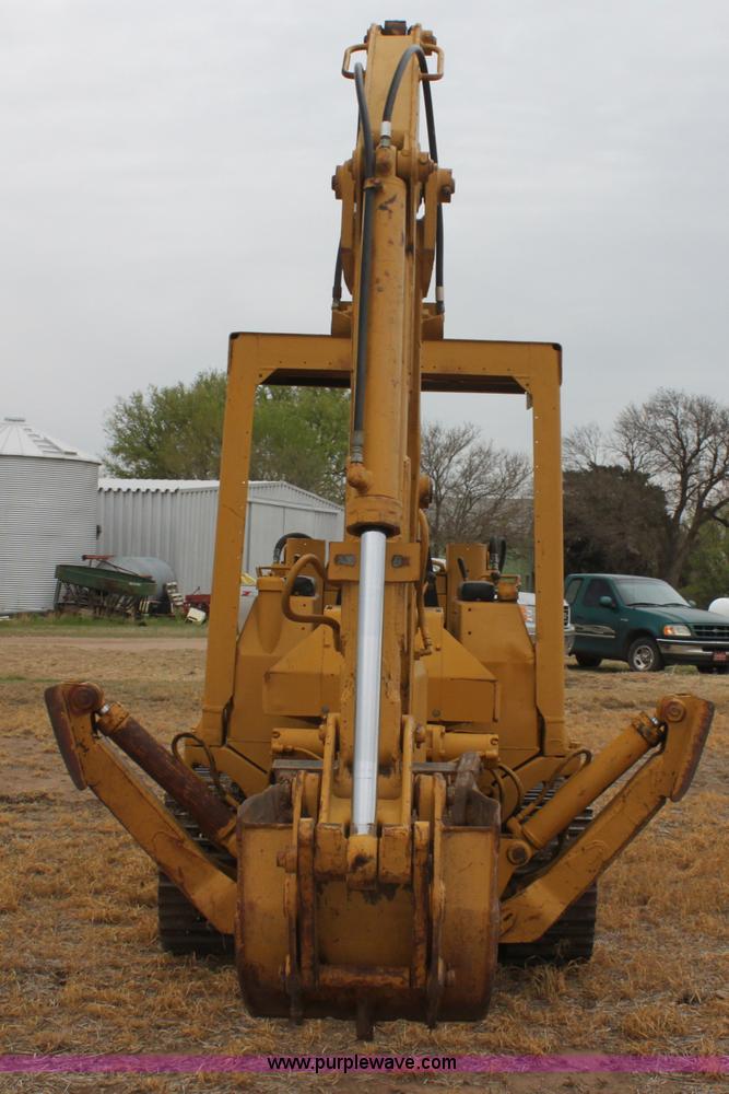 image for item H2112 1979 Caterpillar 931 track loader with backhoe attachment