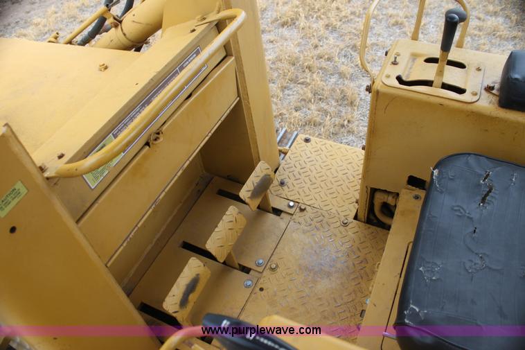 image for item H2112 1979 Caterpillar 931 track loader with backhoe attachment