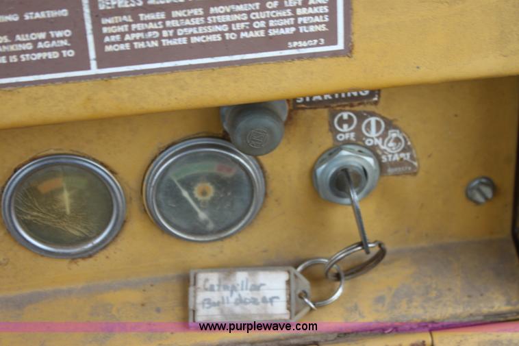 image for item H2112 1979 Caterpillar 931 track loader with backhoe attachment