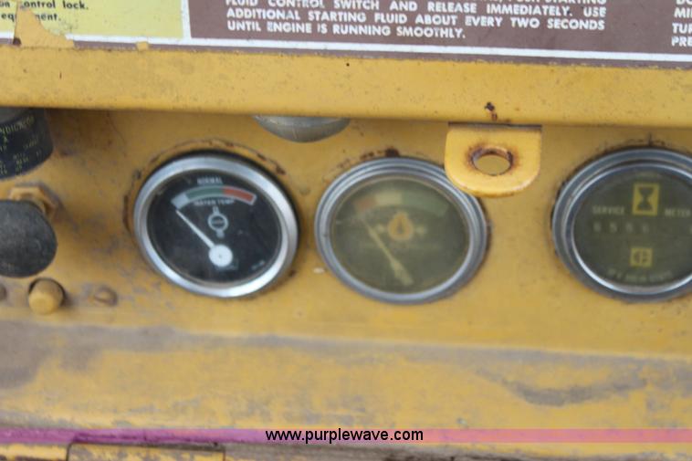 image for item H2112 1979 Caterpillar 931 track loader with backhoe attachment