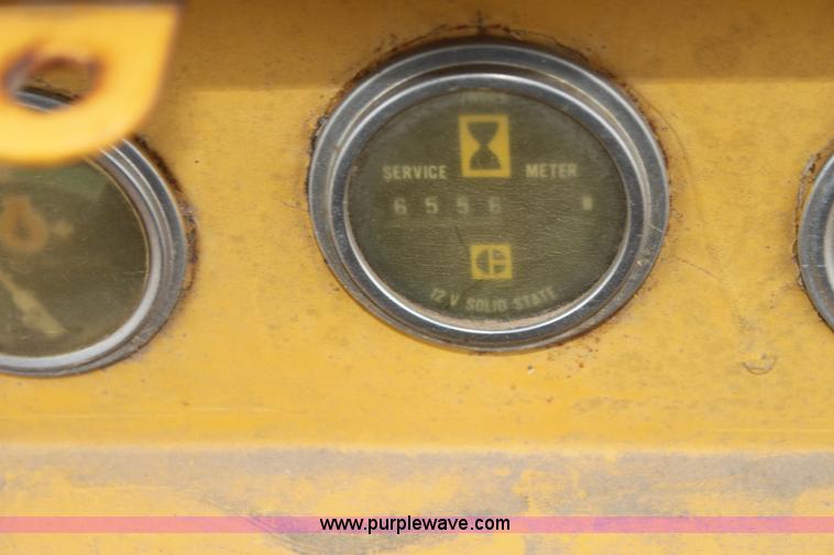 image for item H2112 1979 Caterpillar 931 track loader with backhoe attachment