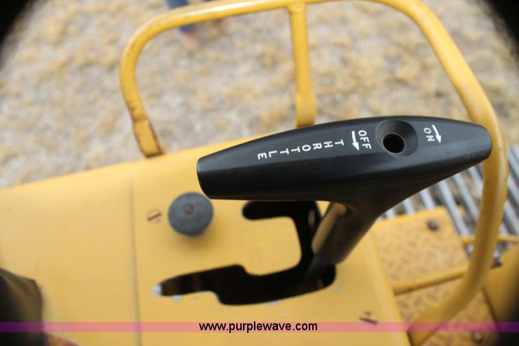 image for item H2112 1979 Caterpillar 931 track loader with backhoe attachment
