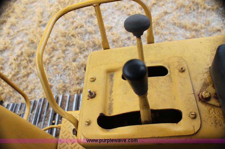 image for item H2112 1979 Caterpillar 931 track loader with backhoe attachment