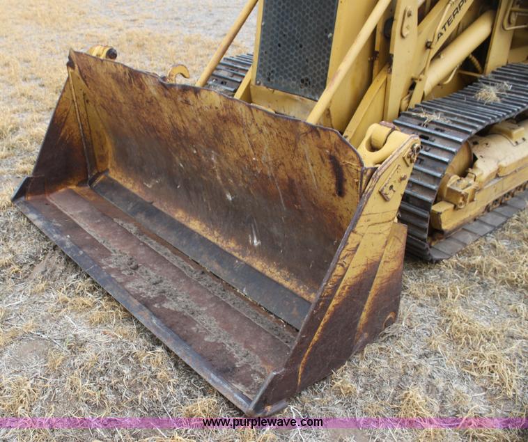 image for item H2112 1979 Caterpillar 931 track loader with backhoe attachment