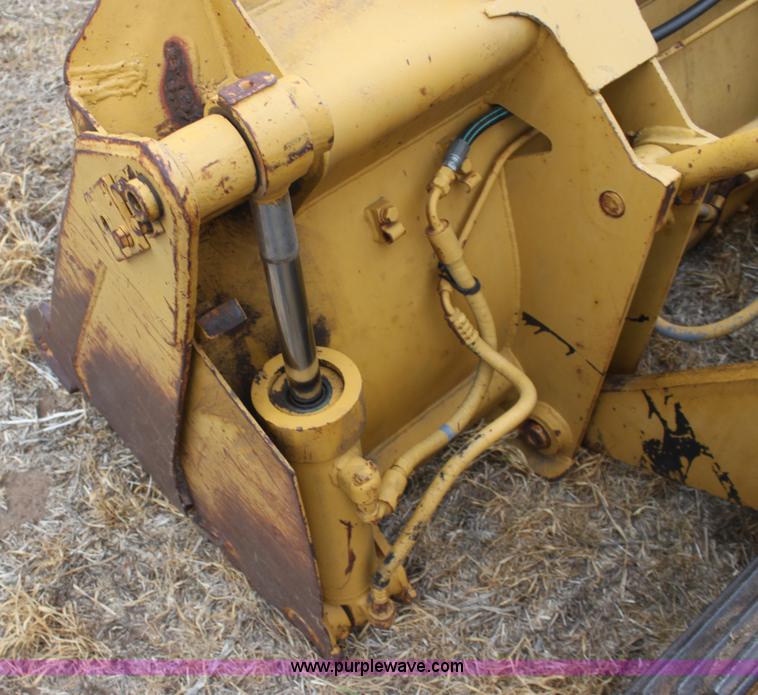 image for item H2112 1979 Caterpillar 931 track loader with backhoe attachment