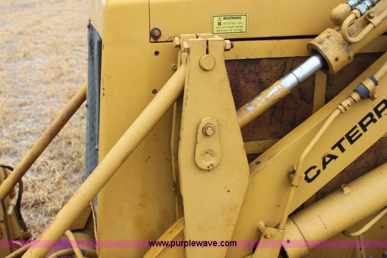 image for item H2112 1979 Caterpillar 931 track loader with backhoe attachment