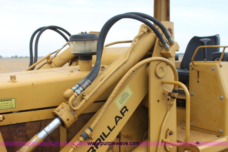 image for item H2112 1979 Caterpillar 931 track loader with backhoe attachment