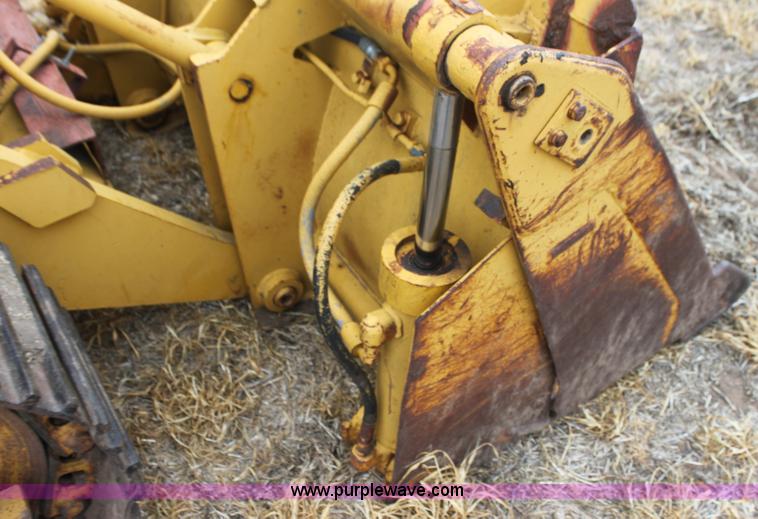 image for item H2112 1979 Caterpillar 931 track loader with backhoe attachment