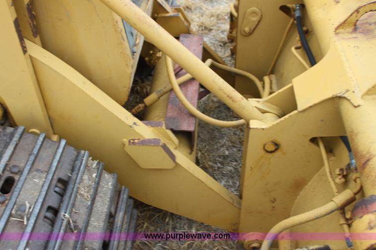 image for item H2112 1979 Caterpillar 931 track loader with backhoe attachment