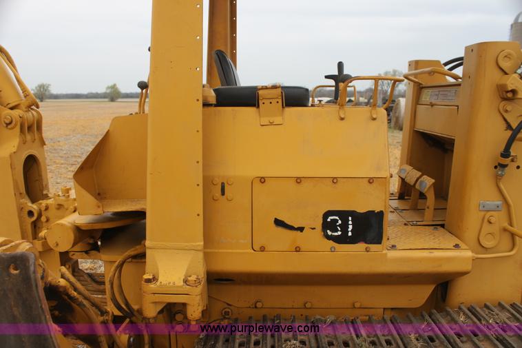 image for item H2112 1979 Caterpillar 931 track loader with backhoe attachment